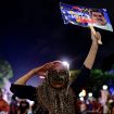 A supporter of Venezuela's President Nicolas Maduro gestures during the presidential election, in Caracas, Venezuela July 28, 2024. REUTERS/Maxwell Briceno