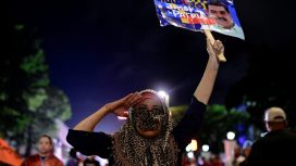 A supporter of Venezuela's President Nicolas Maduro gestures during the presidential election, in Caracas, Venezuela July 28, 2024. REUTERS/Maxwell Briceno